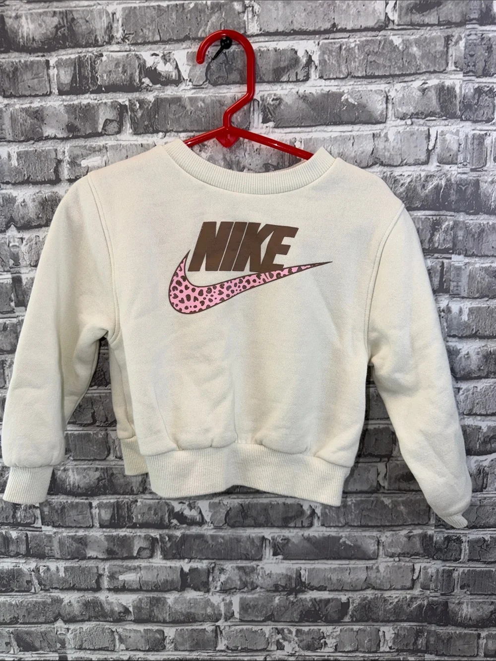 Girls Nike Cream Crewneck with Brown Logo and Pink Leopard Swoosh